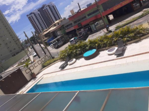 FLAT ENCANTADOR A UM PASSO DA PRAIA